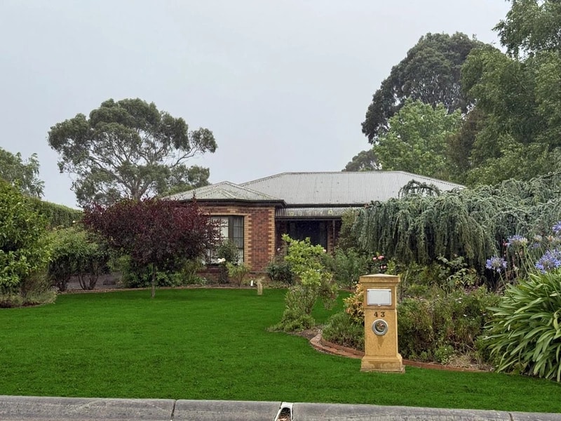 Property with lush green lawn